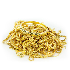 a pile of gold jewelry